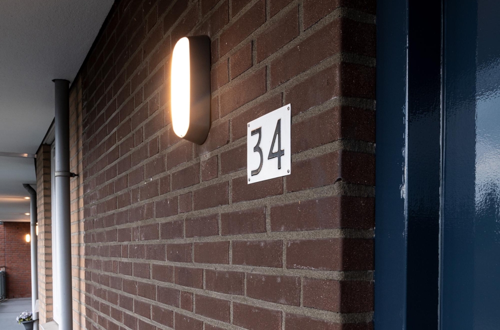 Lightronics RINK armatuur bij een woning in een appartementencomplex van Veluwonen in Eerbeek